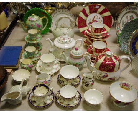 Tea and Dinner wares - A Spode part tea setting decorated in fanciful birds with rouge and cream striped border, picked out i