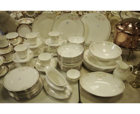 A Royal Doulton Twilight Rose pattern H5096 part dinner service comprising dinner plates side plates dessert bowls teacup and