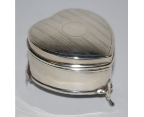 An Edwardian silver love heart shaped sewing box, engine turned cover, vacant cartouche, dated 1918 