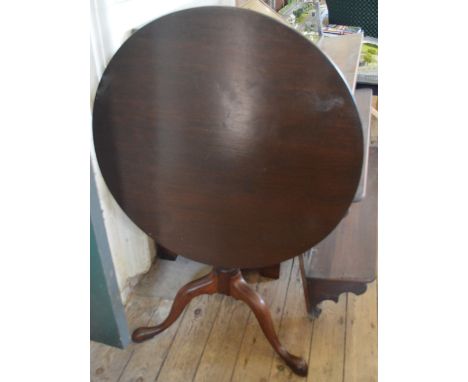 A Mahogany tilt top tripod table