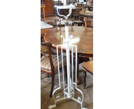 A painted metal lamp standard