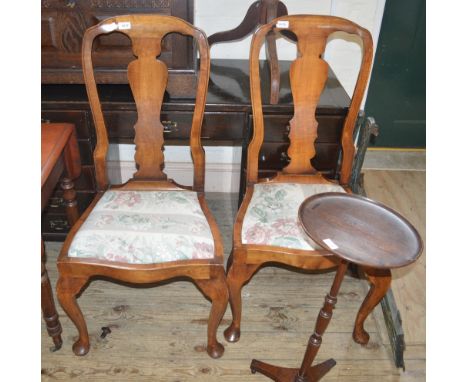 A pair of Walnut dining room side chairs and two tripod tables