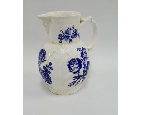 19th century Royal Worcester leaf moulded jug with mask head spout and blue underglaze floral pattern, (a/f), 20cm high