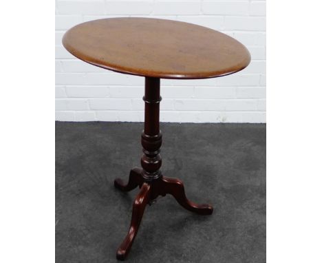 Mahogany oval top occasional table on a turned column and tripod supports,  75 x 62cm