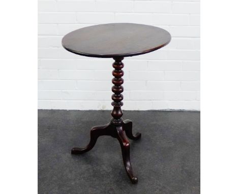 Mahogany occasional table, the oval top on bobbin turned column and tripod base