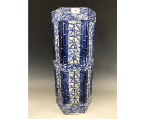 An oriental porcelain stick stand, having moulded and painted blue and white decoration in depiction of bamboo, 60 cm 