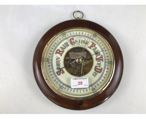 A Victorian mahogany wheel barometer, 9 inch diameter