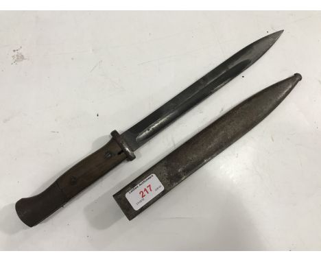 A 1942 German K98 bayonet, stamped 42 cof, matching serials on scabbard and bayonet, (scabbard a/f)