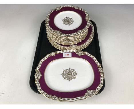 A quantity of Royal Worcester dinner ware including two oval plates, four plates and eight dessert plates