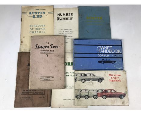An Austin A40 MKI and MKII driver’s handbook together with Austin A40 accessories list, an Austin A35 "schedule of repair cha