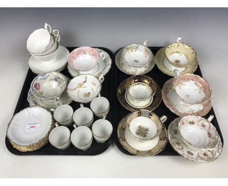 A quantity of cabinet cups and saucers including Royal Doulton, Minton and Royal Worcester etc