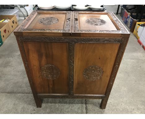 A 20th Century Chinese carved camphor wood chest / cabinet, 63 x 39 x 76 cm high