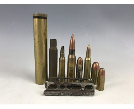 A small quantity of inert small arms ammunition, a clip and rifle oil bottle