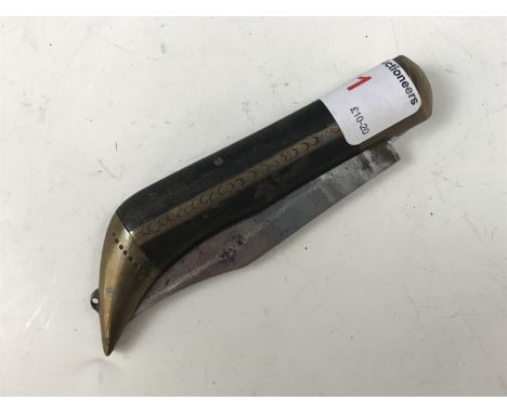 An antique folding clasp knife with horn grip scales