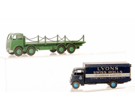 A Dinky Supertoys 'Lyons Swiss rolls' No 514 Guy van, a green Foden chain lorry and a Dinky toy catalogue