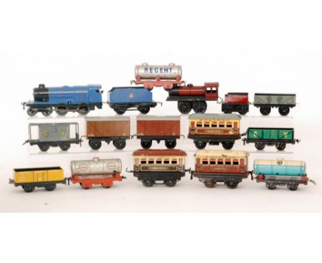 A Chad Valley O gauge 4-4-0 locomotive and tender in blue livery, a 0-4-0 tank loco and tender, a Fresh Milk tanker, three Ho