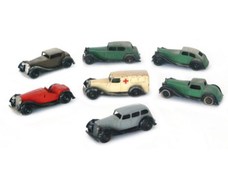 Various Dinky Series 30 and 36 to include an ambulance, Daimler and Rover various coloured saloons and a red Salmson two seat