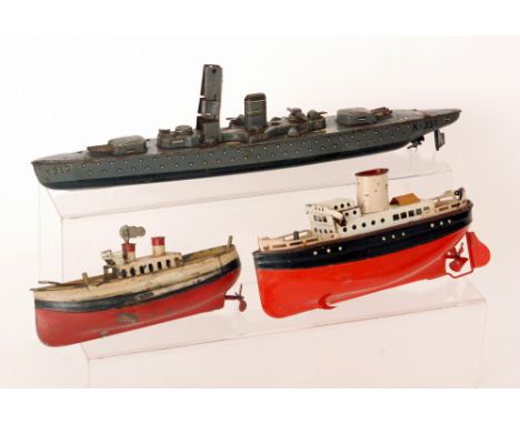 A Kellermann &amp; Co battleship in lithographed grey K-351, length 33cm, a small Fleischmann single funnel liner black and r