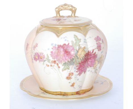 A late 19th Century Royal Worcester blush ivory lobed jar and cover, shape 1412 with associated stand, also shape 1412, both 