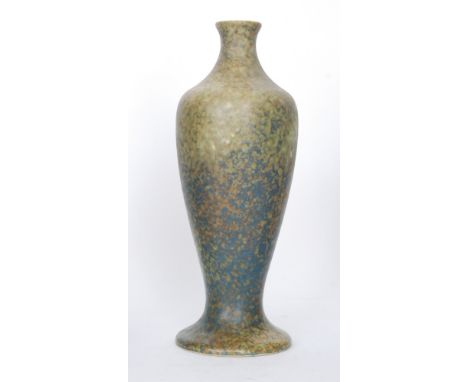 A Ruskin Pottery lamp base of footed Mei Ping form decorated in a mottled green and blue tonal glaze, impressed mark, dated 1