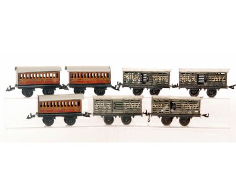 Four Bing O gauge milk traffic wagons and churns, also three Bing LMS coaches in red and grey livery, S/D. (qty)