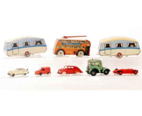 A Marx tinplate clockwork tank, a red sedan car, two caravans, a Wells Brimtoy transport bus, a Minic American jeep, five sma
