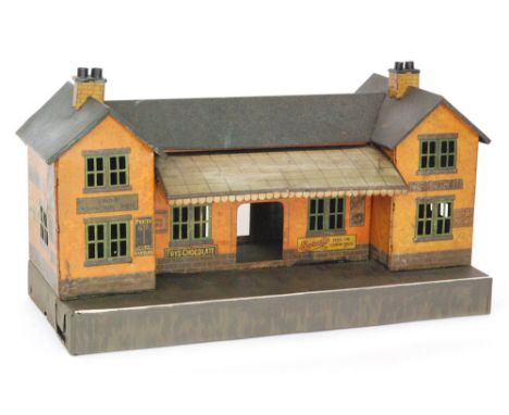 A Bing O gauge tinplate station with lithograph advertising for 'Drink Liptons Tea, a similar platform station 'Robin Starch'