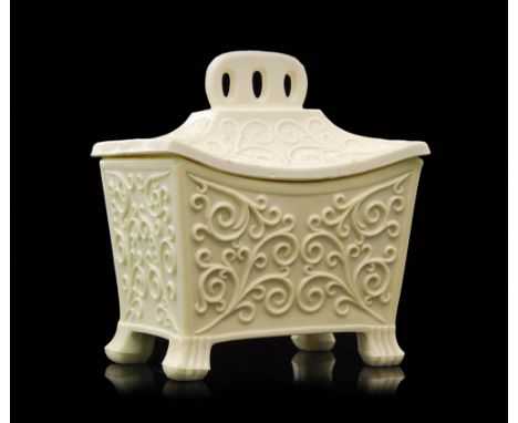 A late 19th Century Sowerby Queens Ivory pressed glass miniature tea caddy in the Aesthetic taste of tapered rectangular form