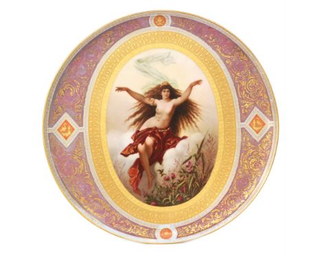 A large 19th Century Vienna porcelain charger decorated after the original by Hans Makart with a hand painted oval portrait o