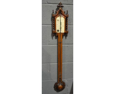 A 19th Century carved walnut Gothic barometer, the scale inscribed Mark Hill, Birmingham, height 109cm