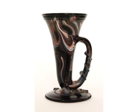 A late 19th Century Davidson pressed glass vase in the form of a bugle atop a circular base in purple malachite, height 14cm,