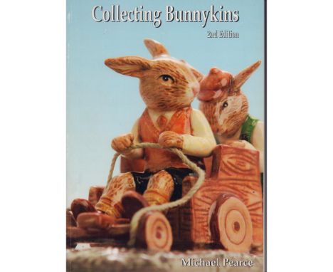 Guidebook and pricing catalog for Royal Doulton's Bunnykins, includes hundreds of color photographs within 190 pages. Signed 