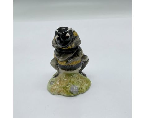 A bee modeled with its antenna and wings downward. This item has its original box measuring 3"L x3"W x 4.25"H. Royal Albert b