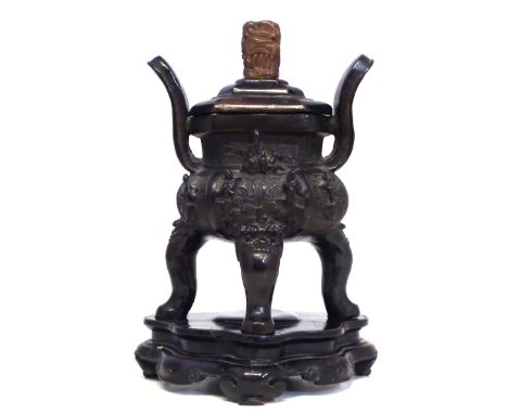 Chinese archaic style bronze ding censor , with later wood cover and soapstone finial, Ming period, on wood stand, the bronze