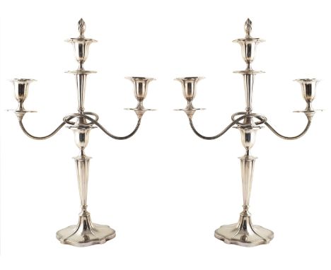 A pair of 1920s Walker &amp; Hall silver 3-branch candlearbrum, each designed as a tapered stem with urn shape centre suspend