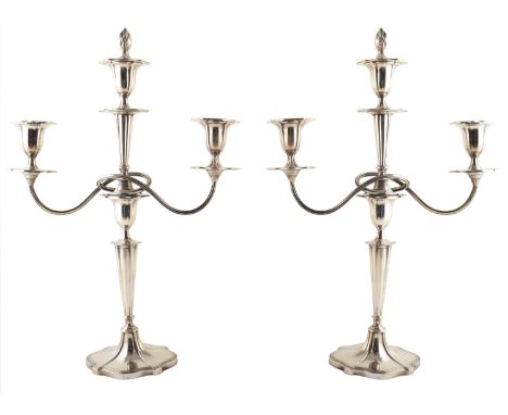 A pair of 1920s Walker &amp; Hall silver 3-branch candlearbrum, each designed as a tapered stem with urn shape centre suspend