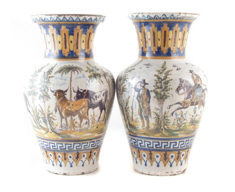 Pair of Faïence vases , painted with hunting scenes, mid 19th century, 41cm high CONDITION REPORT: Both with re-stuck section