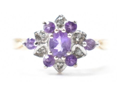 A hallmarked 9ct gold, amethyst &amp; diamond cluster ring. Import mark for London. Weighs approx 2.8g. Size P.5.