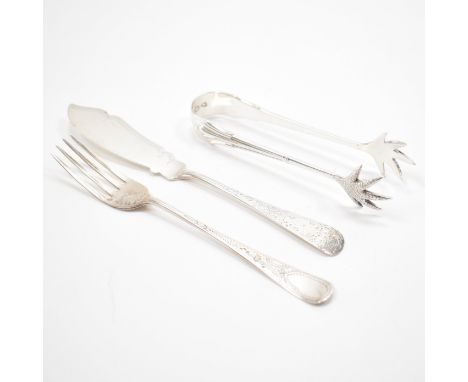 A group of silver hallmarked flatware. The lot to include a pair of sugar tongs (hallmarked London 1895), a small fork with e