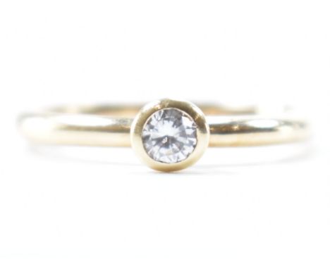 A hallmarked 9ct gold and CZ Virtue solitaire ring. Hallmarked London. Weight 1.3g.Size N.