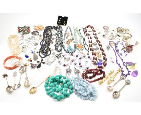 A large collection of vintage costume jewellery to include beaded necklaces, simulated pearls, bangles, bracelets, earrings, 