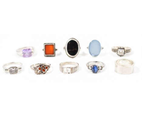 A collection of silver &amp; white metal rings. To include; .four single stone set rings, two stone set &amp; marcasite rings