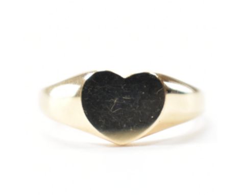 A hallmarked 9ct gold heart signet ring. Hallmarked for Sheffield. Weight approx 4.4g. Size K.