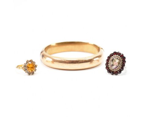 A vintage gold filled bangle bracelet together with two stone set rings. The hinged bangle of D form having a clip clasp, tog