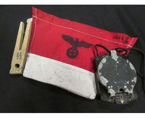 German WW2 pocket compass with small triangular pennant and SS peg