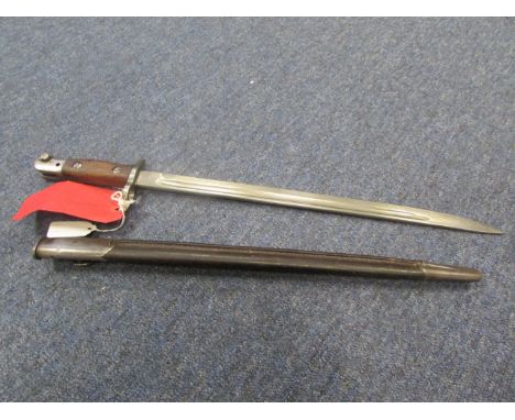 Bayonet: P.07 SMLE bayonet by Wilkinson made October 1917. Pommel marked 'SAP' (South African Police) and with 5th African Go