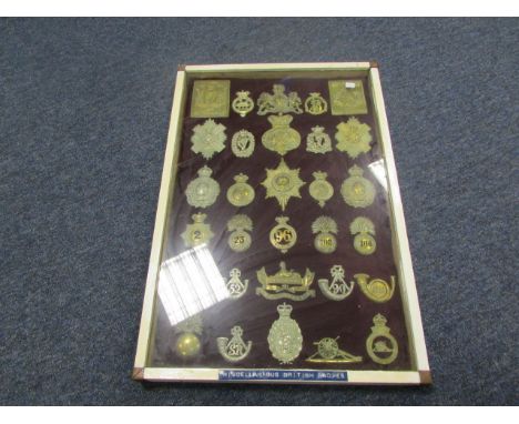 Military badges - mixed old collection in frame including pouch plates, hat badges, etc. May contain resrtikes (Buyer collect