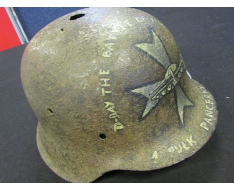 Polish interest a German M40 steel helmet, painted with commemorative Polish Armoured Brigade for Normandy somewhat rusted pi