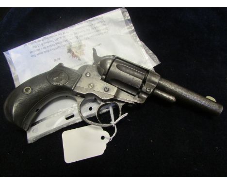 Revolver: A Colt .38 Cal Model 1877. 'Lighting' Wild West revolver. Double action (working but trigger return spring a/f). 6 