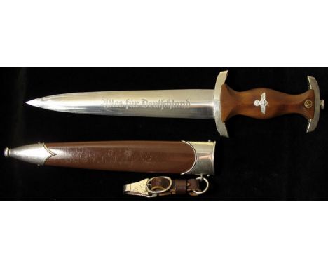 German Nazi S.A. dagger of the late production period 1939 to 1942. Polished bade marked 'RZM' and 'M7/42'. In its scabbard w